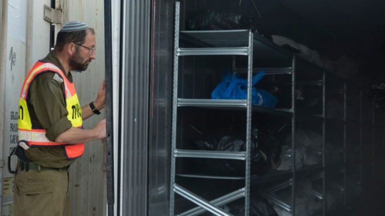 At the army base where Israel identifies its dead: ‘They went from house to house burning family after family’