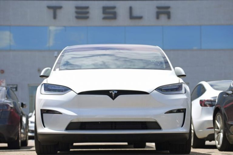 Tesla job cuts heighten Wall Street concerns that EV maker faces a demand problem